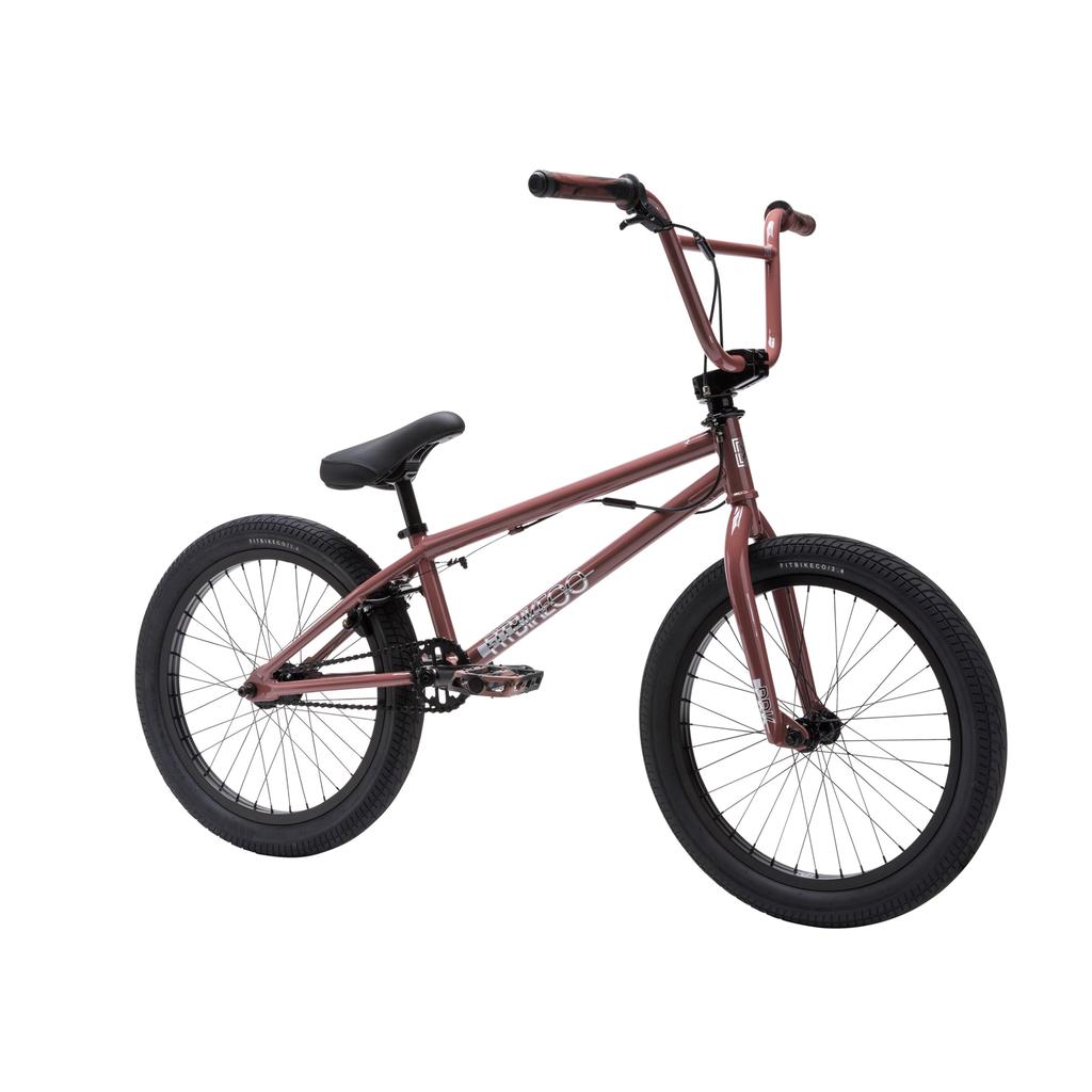 The Fit Bike Co PRK 20 Inch Bike, a maroon BMX park bike with a short top tube, black tires, black seat, and handlebars, is displayed on a white background.