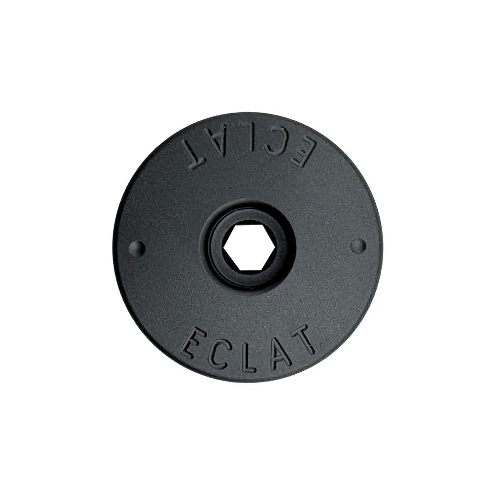 The Eclat Jackal Fork Preload Bolt is a black, circular metal top cap with a hexagonal center hole and "ECLAT" engraving, designed for éclat Jackal Titanium forks with an M18 thread.