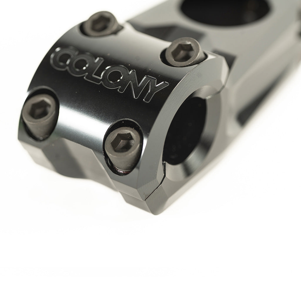 A close up image of the Colony Variant 52mm BMX Stem, a black bicycle stem featuring a low-rise alternative to top load stems.