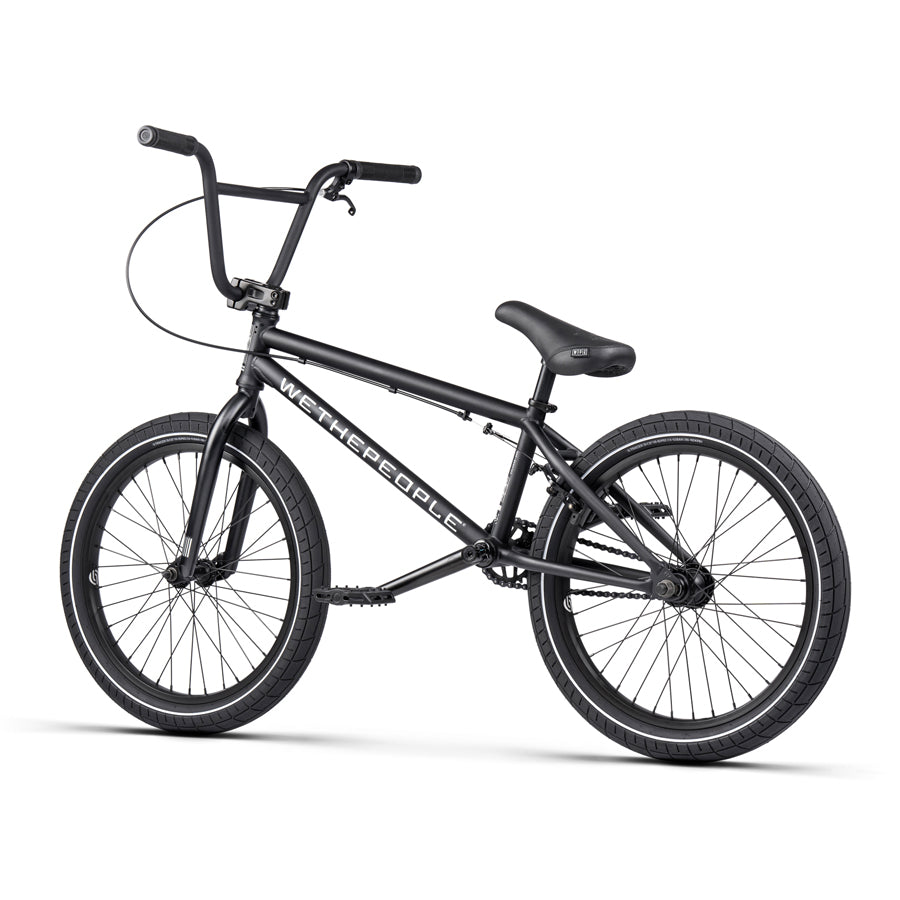The Wethepeople Nova 20 Inch BMX Bike, a black BMX bike, stands out on a pristine white background.