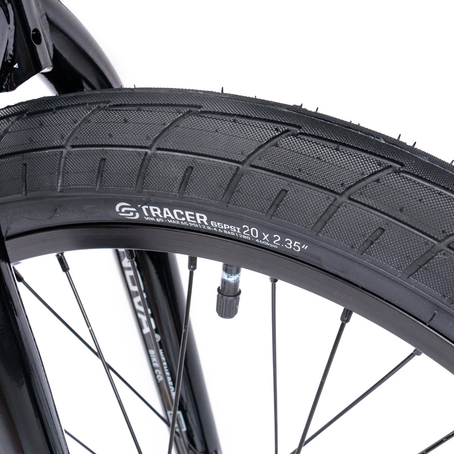 A close up of a black Wethepeople Nova 20 Inch BMX Bike tire.