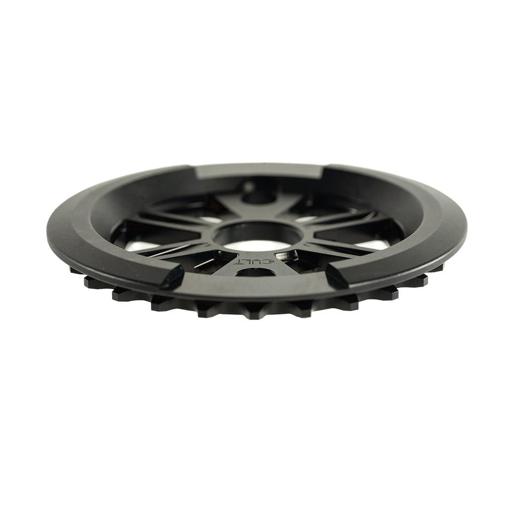 The cult-dak-guard-sprocket, made from tough 7075-T6 aluminium with black metal cut-out spokes, is shown angled on a white background.