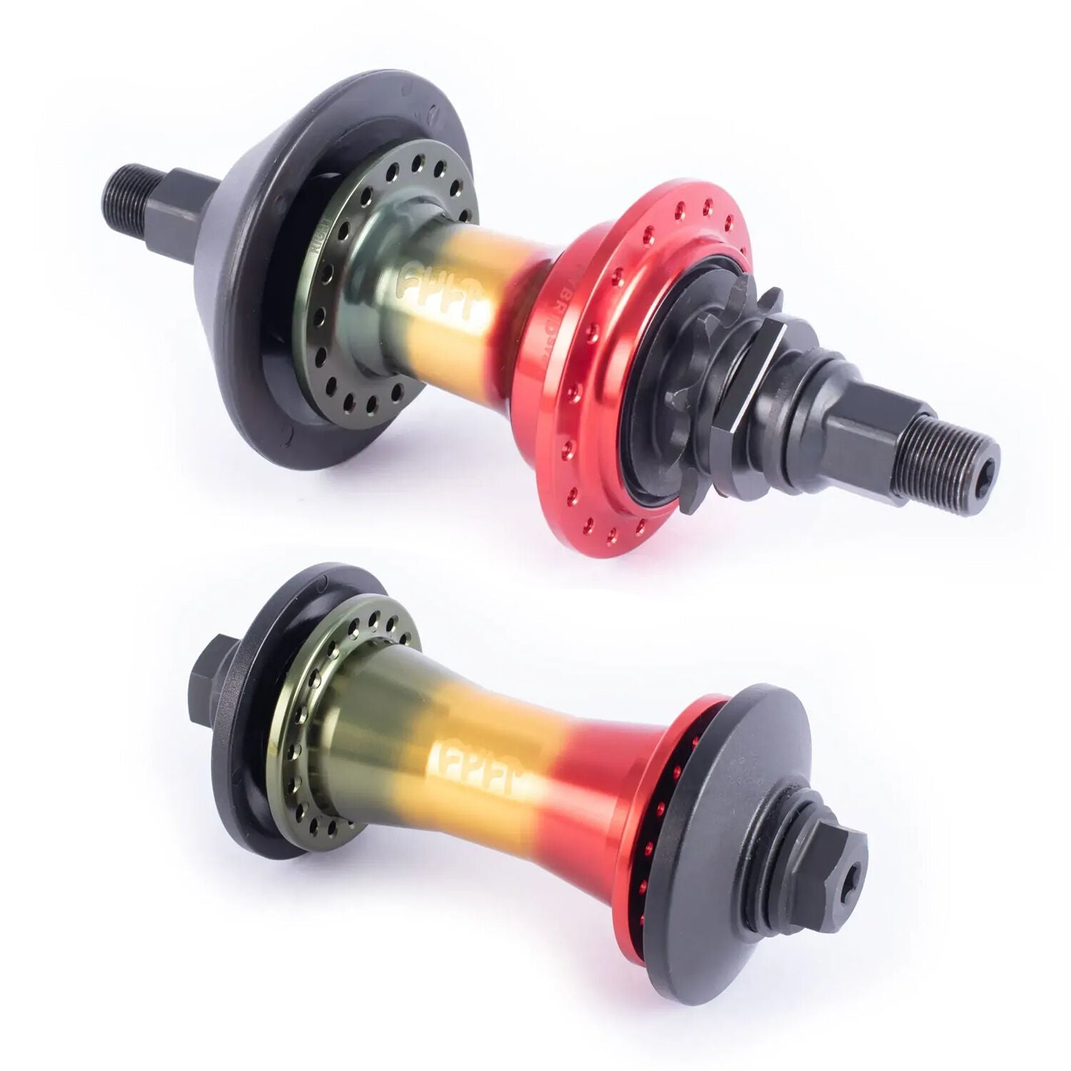 The Cult Crew Rasta Hybrid Freecoaster Hub Set features two colorful BMX hubs in anodized red, green, and gold finishes, displayed on a white background.