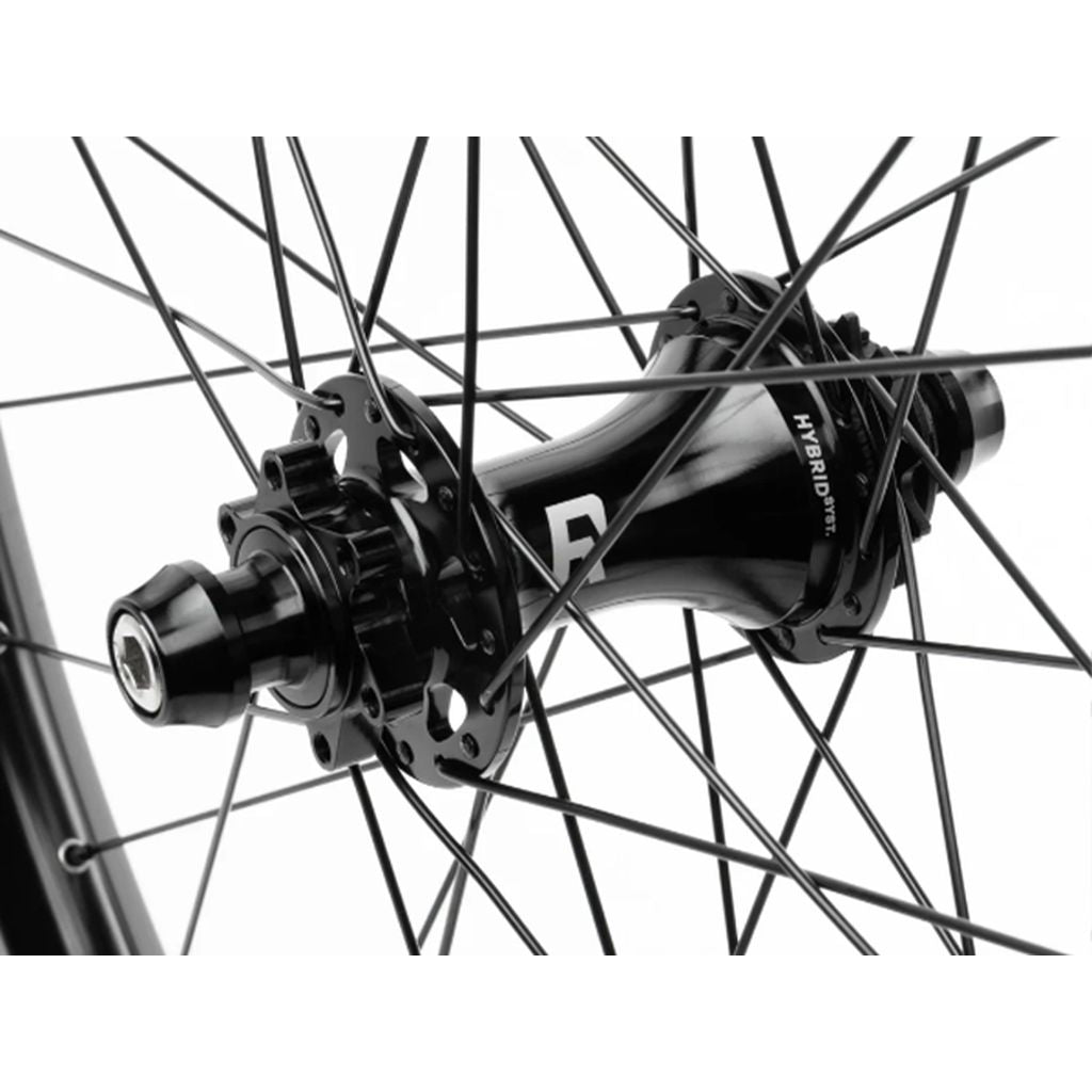 Close-up of a black Radio Orbiter/Sonar 26 Inch Hybrid Cassette/Freecoaster Rear Wheel hub and spokes with a focus on the intricate details of the hub assembly.