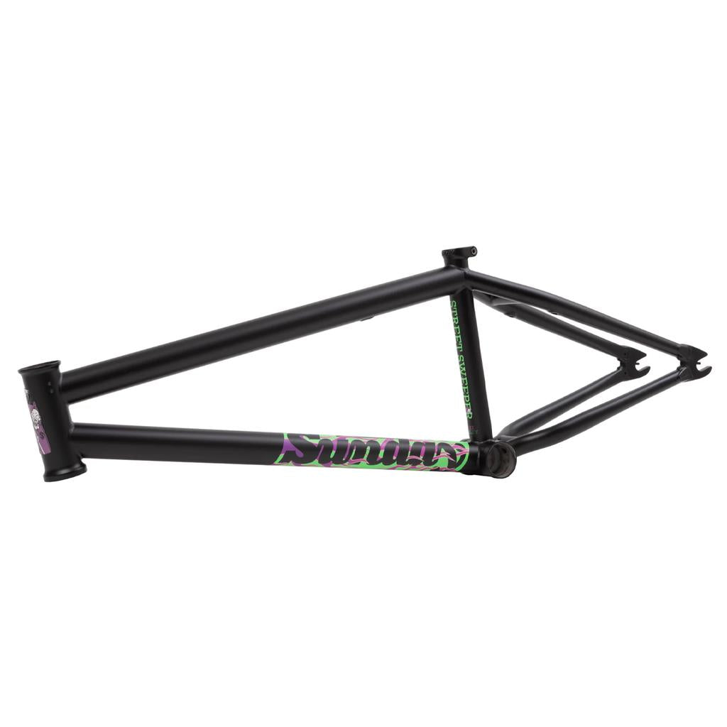 The Sunday Street Sweeper Frame (Jake Seeley Signature) is shown side-on in matte black with a purple and green “Sunday” logo on the downtube, set against a white background.