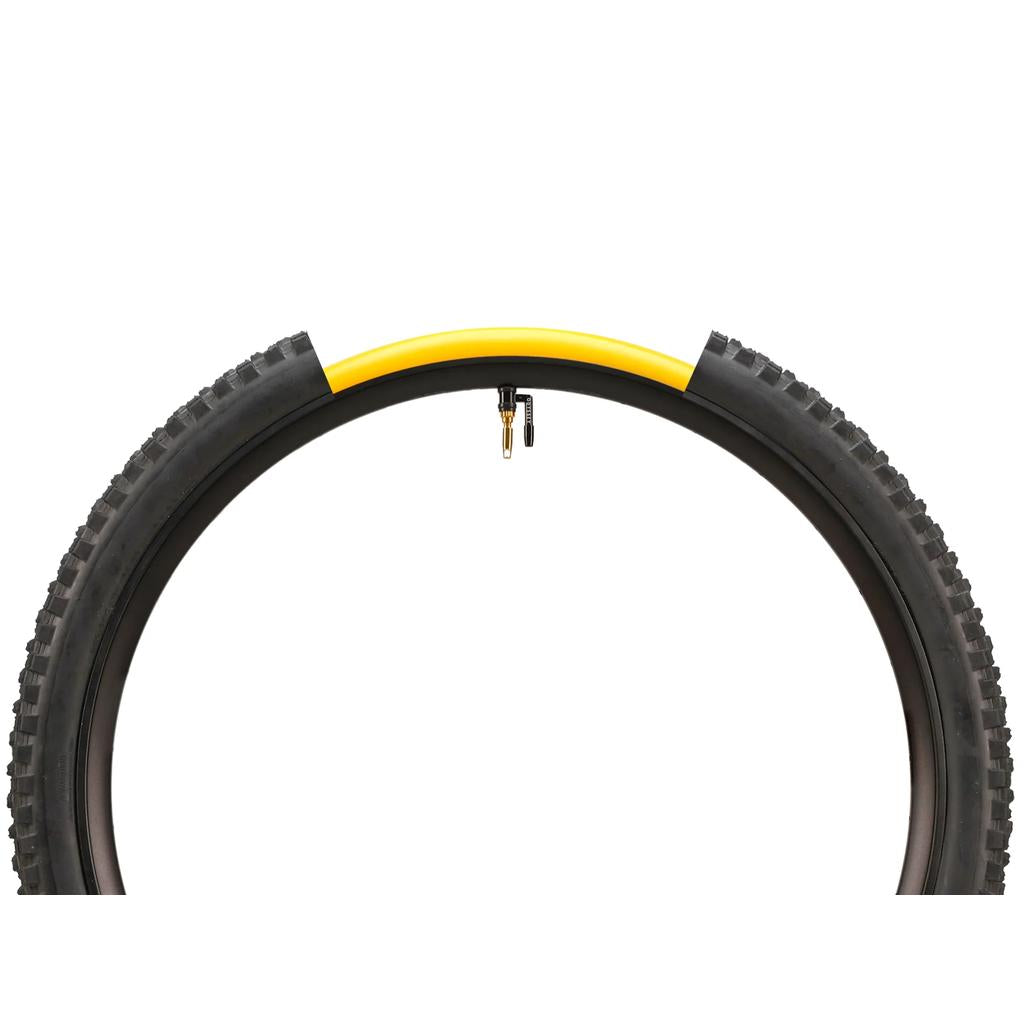 A cross-section of the Odyssey OPTIS Insert With Valve P/V Tube (27.5 Inch) reveals the outer tread, inner tube, and valve stem, highlighting rim protection for improved bike tire performance against a white background.