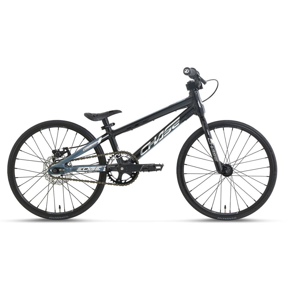 A Chase Edge Micro 18 Race Bike (2027) in black, featuring a lightweight frame, flat handlebars, single gear, and thin tires, shown from the side on a white background.