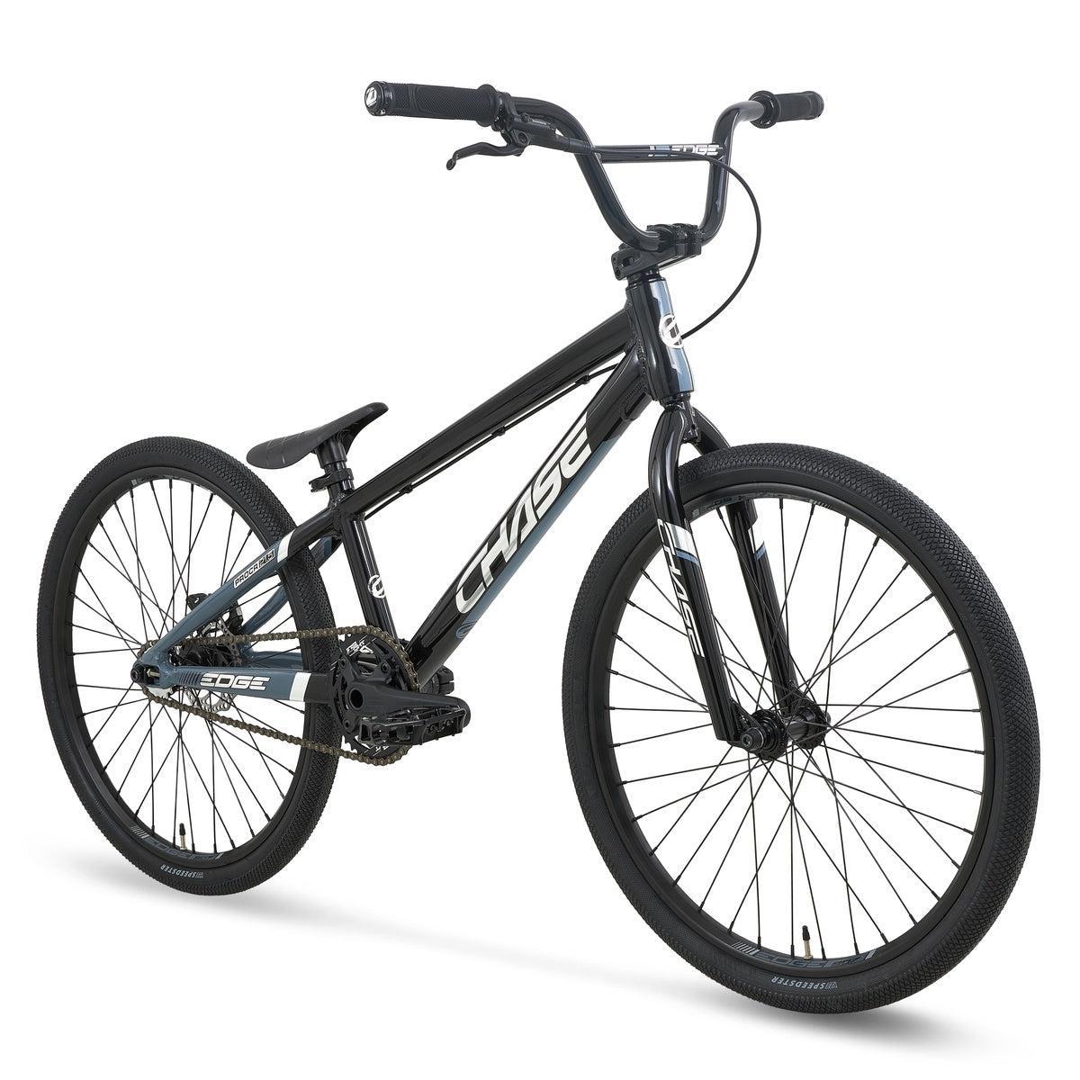 Chase Edge Pro Cruiser Race Bike (2027) in black with bold white “CHASE” branding, equipped with thick tires and straight handlebars, showcasing an integrated head tube and a hydroformed 6061 aluminum frame, is positioned at an angle on a white background.