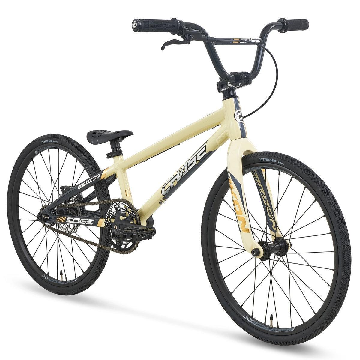 Cream-colored Chase Edge Expert CF Race Bike (2027) with black handlebars, rims, and pedals.