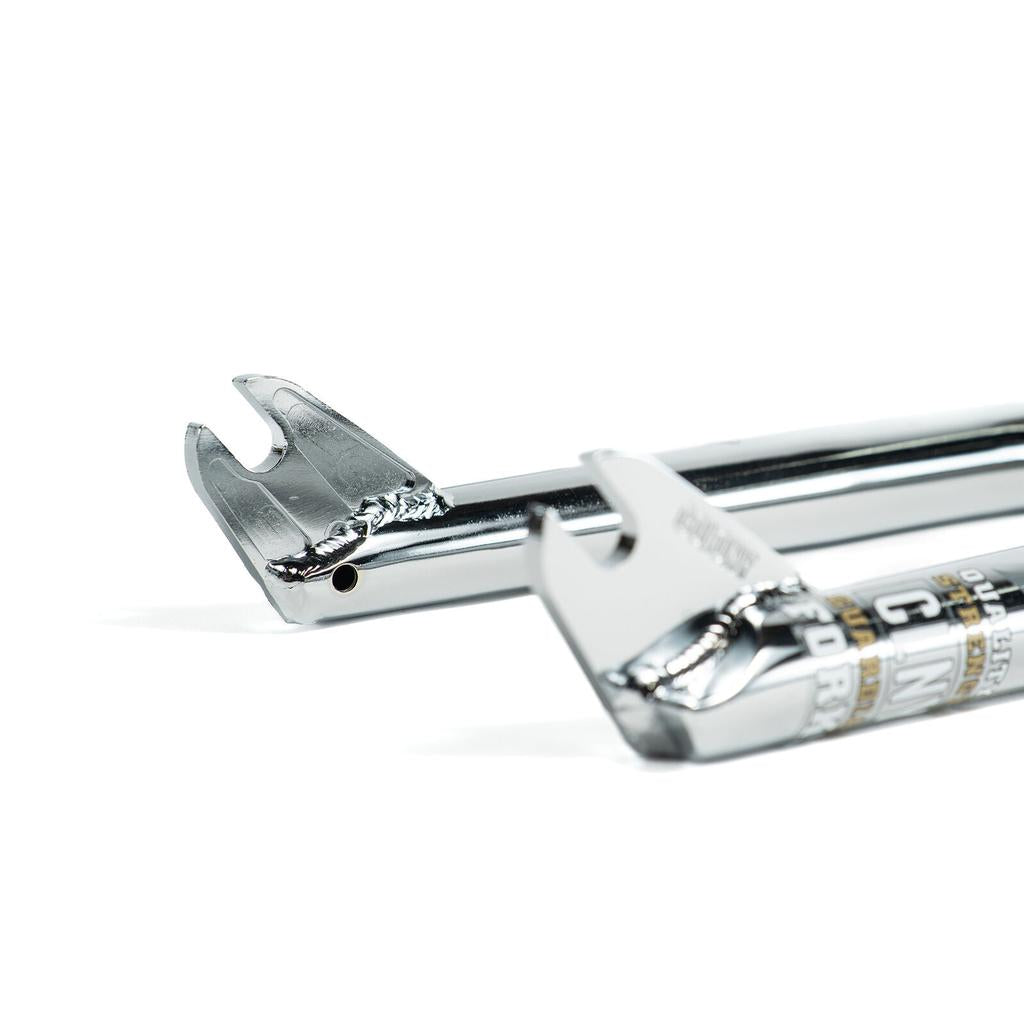 Close-up of two chrome bike pegs with integrated bottle openers, detailed welds, and partial labeling—compatible with Colony Guardian 20 Inch Forks w/ Brake Mounts for modern BMX or front brake setups.