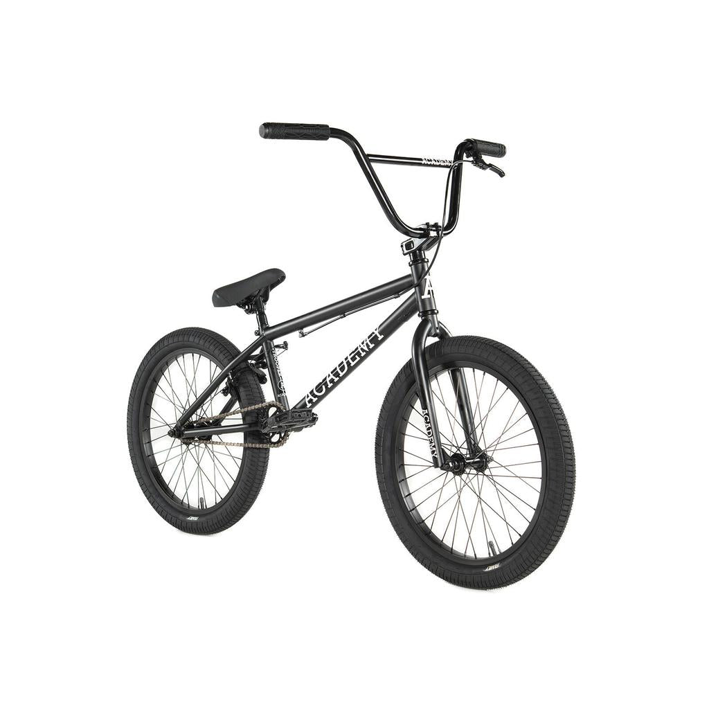 The Academy Trooper 20 Inch Bike, shown in black with thick tires, straight handlebars, and a padded seat on a white background, is perfect for beginner BMX riders.
