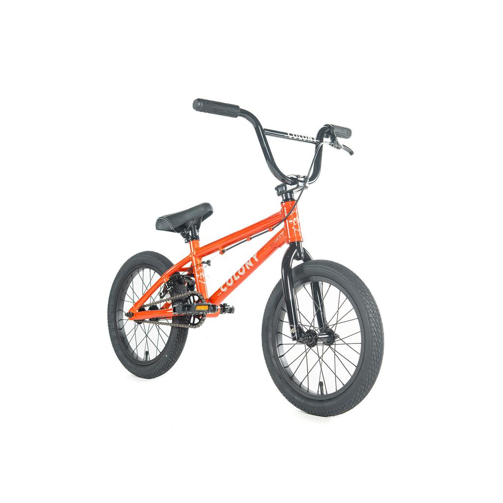 The Colony Horizon 16 Inch Bike is a small orange BMX with black handlebars, seat, and tires, displayed on a white background—ideal for freestyle BMX riders.