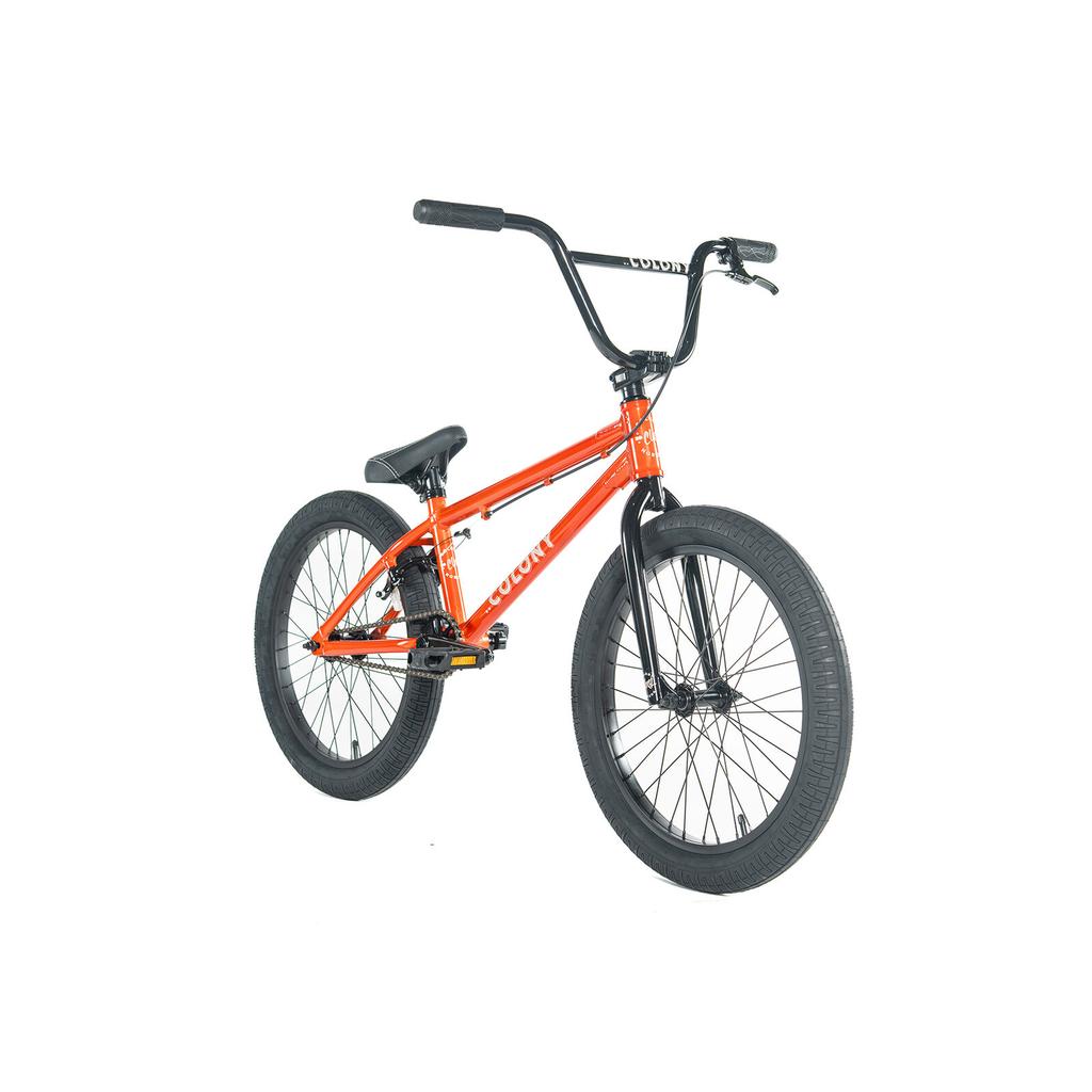 The Colony Horizon 20 Inch Bike, featuring an orange frame with black handlebars, seat, pedals, and tires, is displayed on a white background—ideal for BMX freestyle riders.