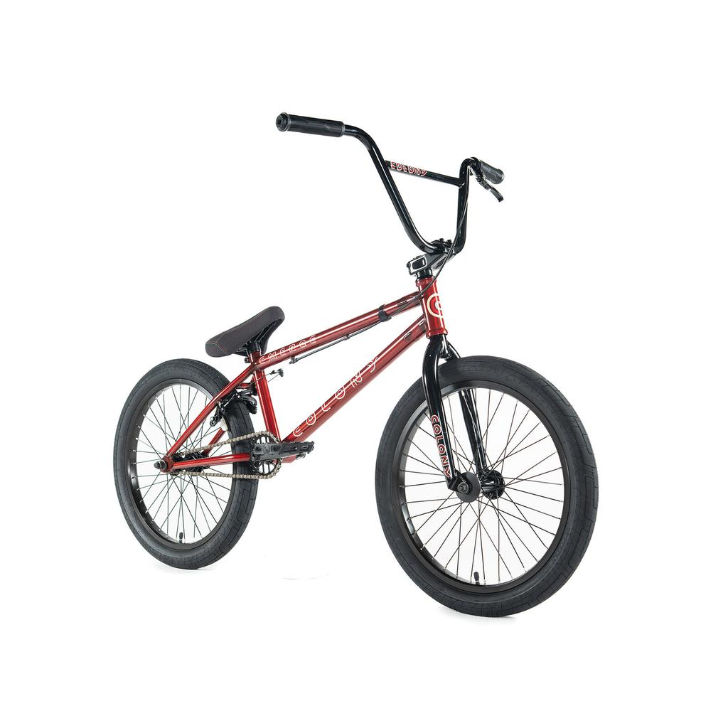 The colony-emerge-bike-2020 is displayed, featuring a red frame with black handlebars, seat, and wheels against a white background.