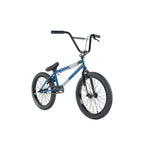 The Colony Premise 20 Inch Bike, a blue chromoly BMX with black handlebars, seat, and double-wall rim wheels, is shown against a white background.