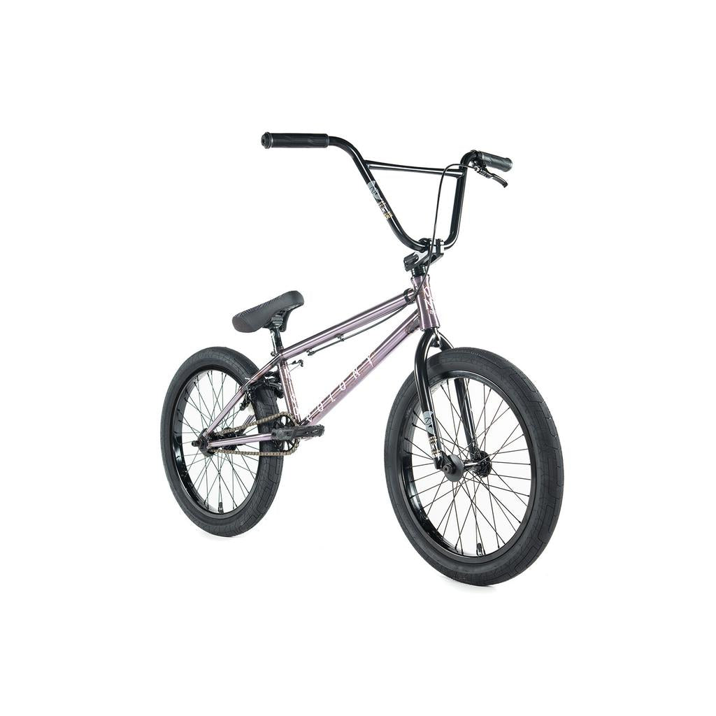 The Colony Rico Elite 20 Inch Bike features a metallic purple frame, black handlebars and seat, and thick black tires for pro-level performance, shown on a white background.