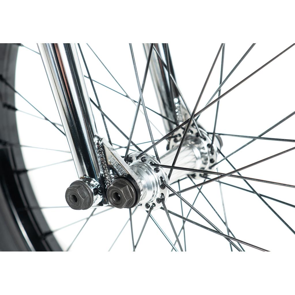 Close-up of a BMX bike wheel hub featuring metal spokes, axle nuts, and front fork against a white background—ideal for fans of the Colony Prody Elite 20 Inch Bike.