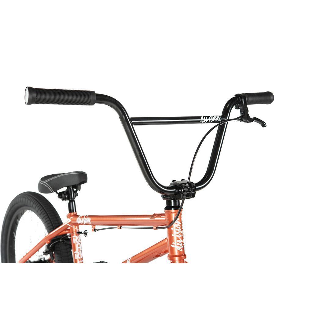 Close-up of the Division Reark 20 Inch Bike, showcasing handlebars, brake lever, cables, and part of its lightweight Hi-Tensile steel frame and seat against a white background.