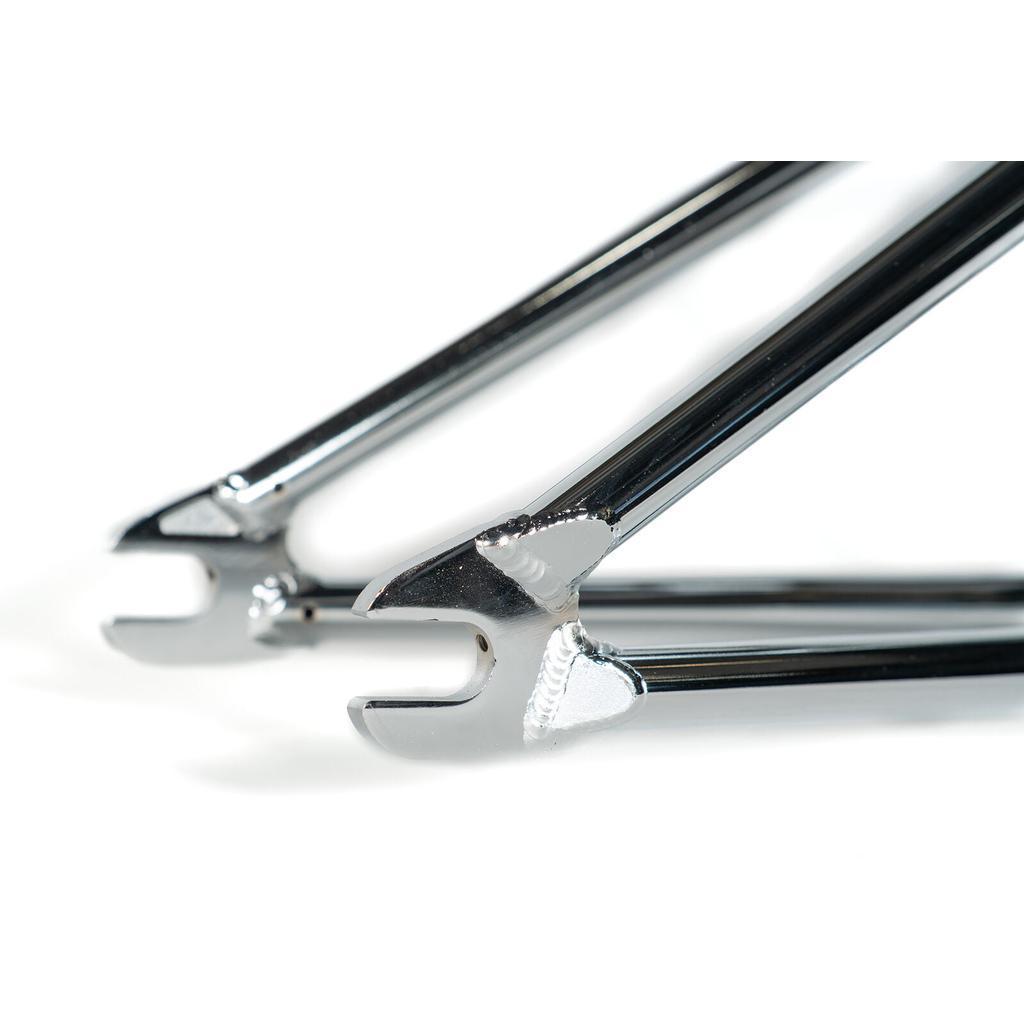 Close-up of two chrome dropouts with visible welds on the Colony Rico 'Lite' Frame, highlighting full CrMo construction, set against a white background.