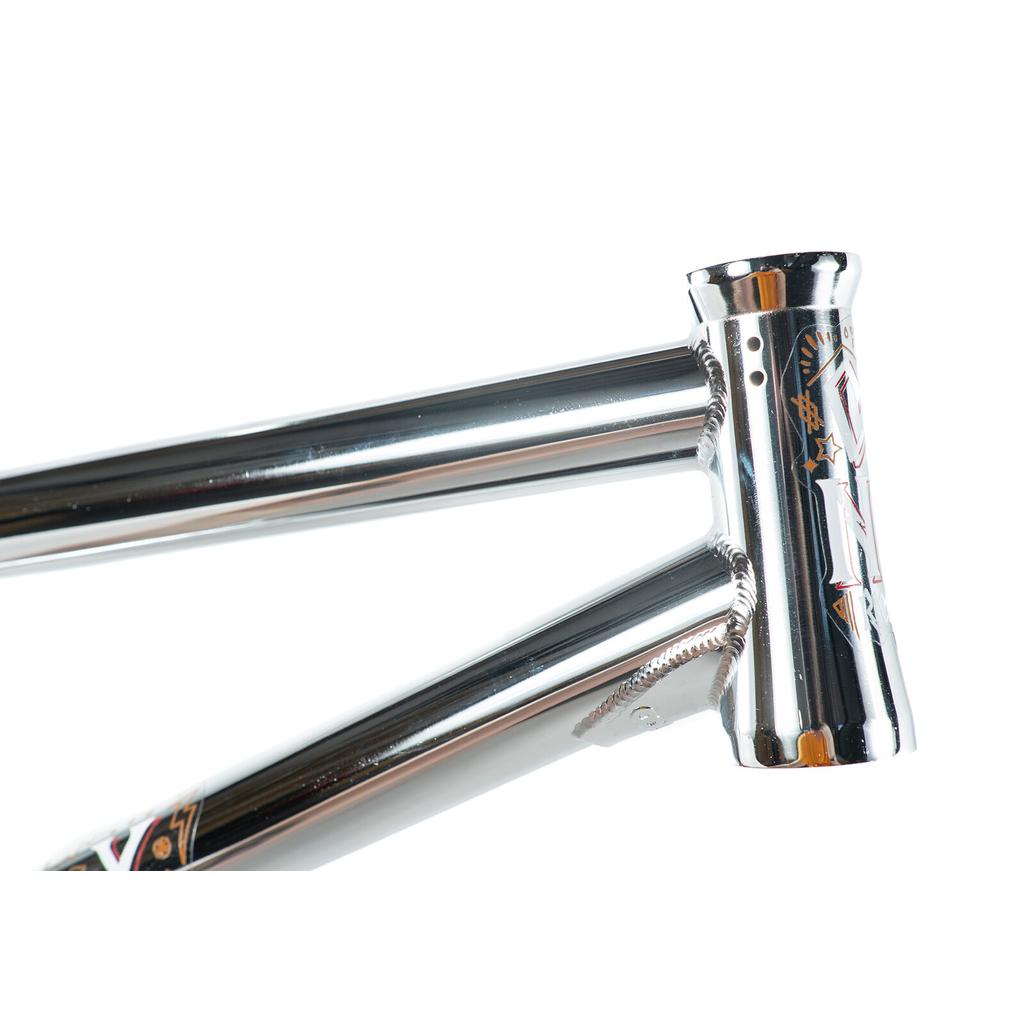 Close-up of the Colony Rico 'Lite' Frame, a chrome BMX frame with full CrMo construction, highlighting the top tube, down tube, head tube, visible decals, and quality welds.