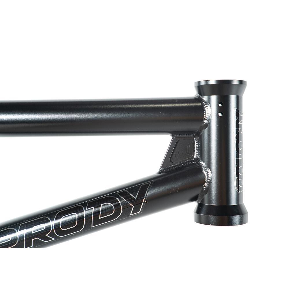 Close-up of the Colony Prody Frame in black, featuring visible welds and Colony branding—ideal for any BMX or freestyle bike setup.