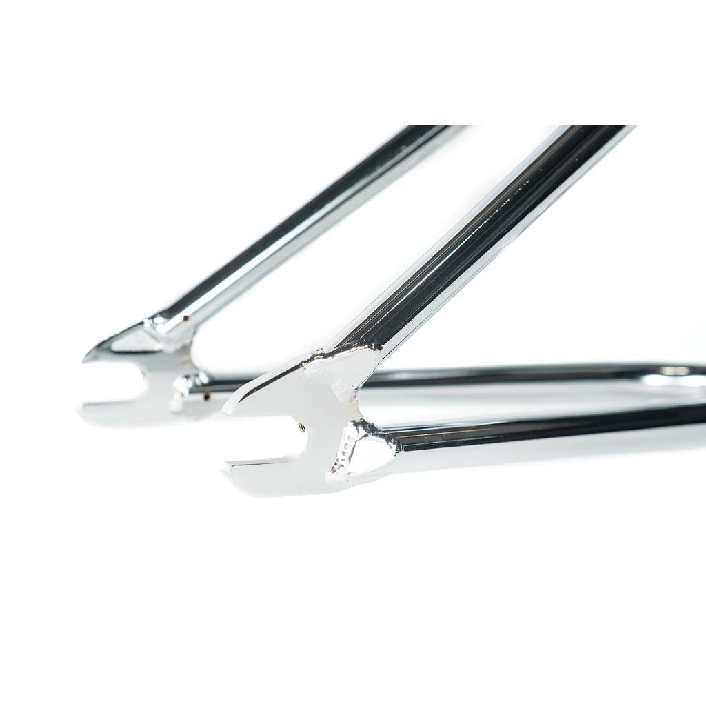 Close-up of two chrome fork dropouts from the Colony Prisma Frame, featuring full CrMo construction and progressive geometry for street BMX, shown against a white background.