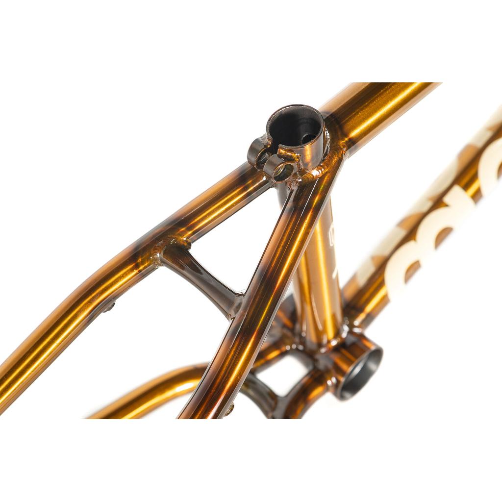 Close-up of a bronze-colored Colony Cadet 18 Inch Frame showing the seat tube junction and rear triangle.