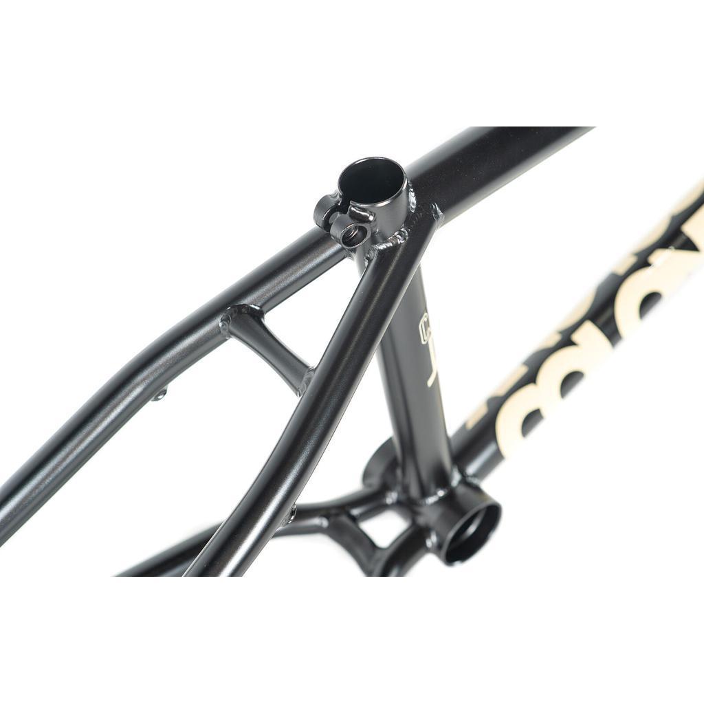 Close-up of the Colony Cadet 20 inch Frame in black, highlighting the seat tube, seat clamp area, and rear triangle with visible welds—showcasing its rugged chromoly construction.