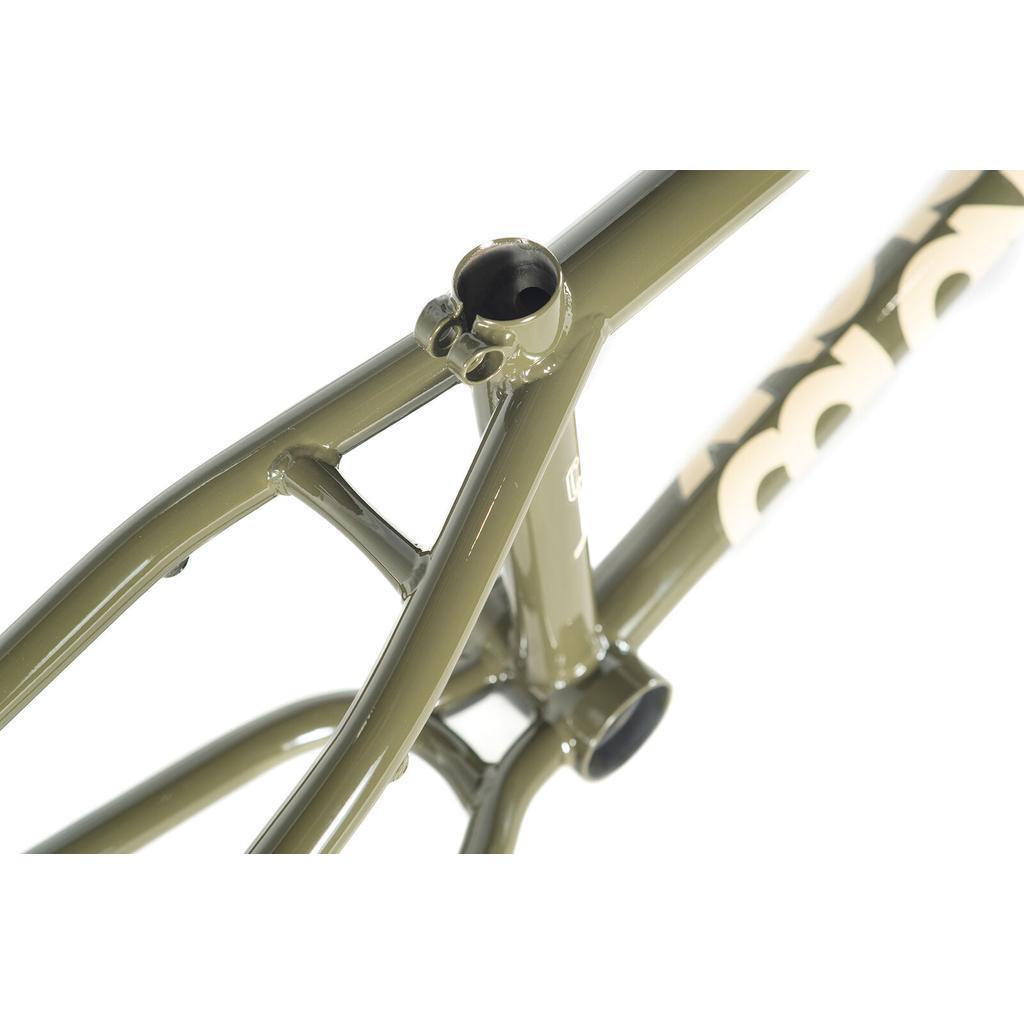 Close-up of the Colony Cadet 20 inch Frame in olive green chromoly, showcasing the rear triangle, seat tube, and bottom bracket with park and street geometry against a white background.