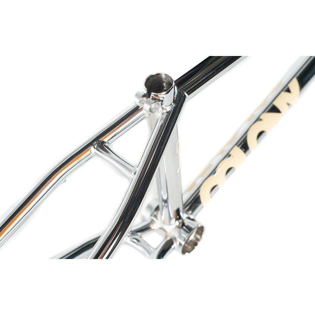 Close-up of the Colony Cadet 20 inch Frame's chrome chromoly construction, highlighting the seat tube, seat stays, and part of the downtube with a partially visible logo on a white background.