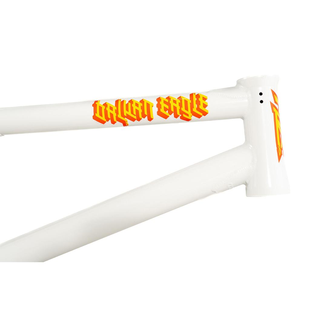 Close-up of a white Colony Balkan Eagle Frame (Renato Rancso Signature) with "GOLDEN EAGLE" written in yellow and red stylized letters on the top tube, highlighting its distinctive design.