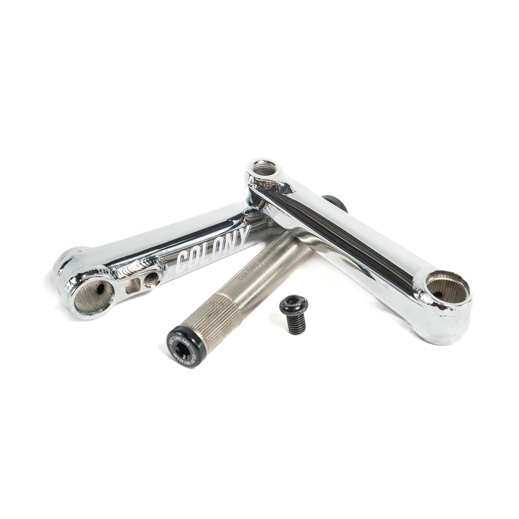 A set of Colony Venator 127mm Cranks (Suit 16" Wheeled Bikes), including two chrome crank arms, a lightweight spindle, and a bolt, arranged neatly on a white background.
