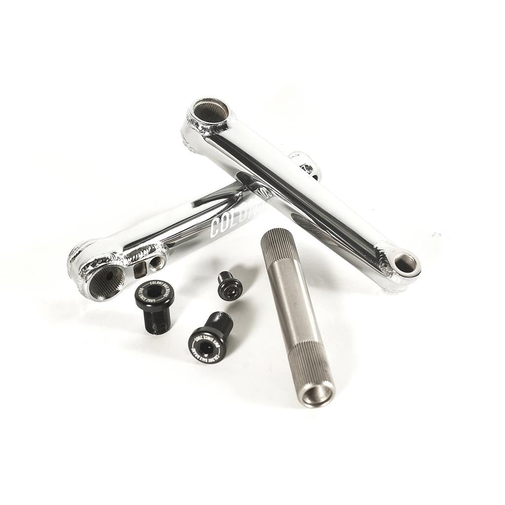 The Colony Venator 127mm Cranks (suit 16" wheeled bikes), including two chrome crank arms, a spindle, and bolts, are arranged on a white background to highlight their lightweight design for BMX performance.