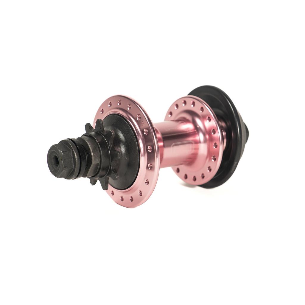 A Colony Wasp Hub Set in rose gold, featuring high performance sealed bearings and multiple spoke holes, isolated on a white background.