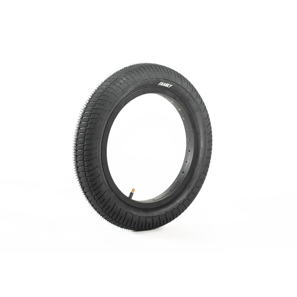 The Family F641 14 Inch Tyre is a black BMX rubber tyre with a knurled tread pattern and visible valve stem, shown standing upright on a white background.