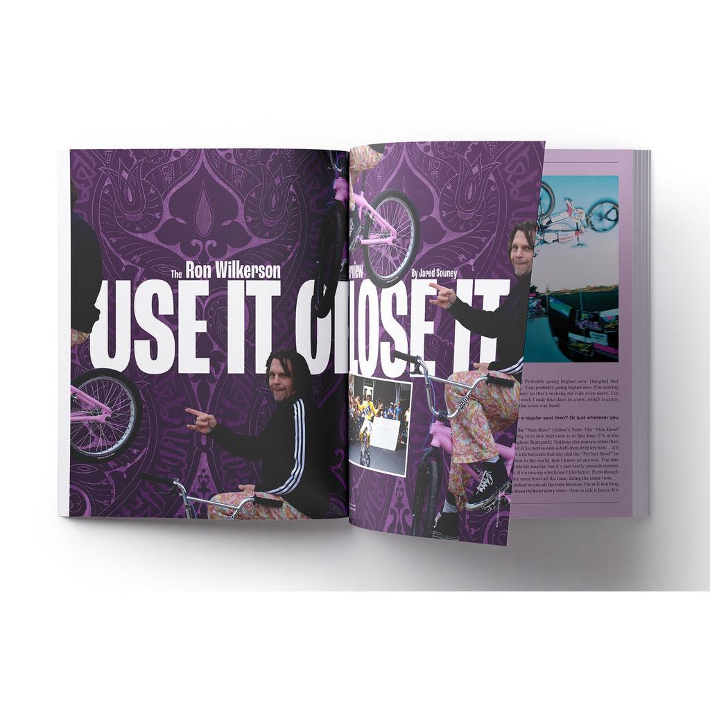 A classic from Greystoke Magazine V2: BMX legend Ron Wilkerson rides with the headline "USE IT OR LOSE IT" over a purple patterned background—true old-school BMX style.