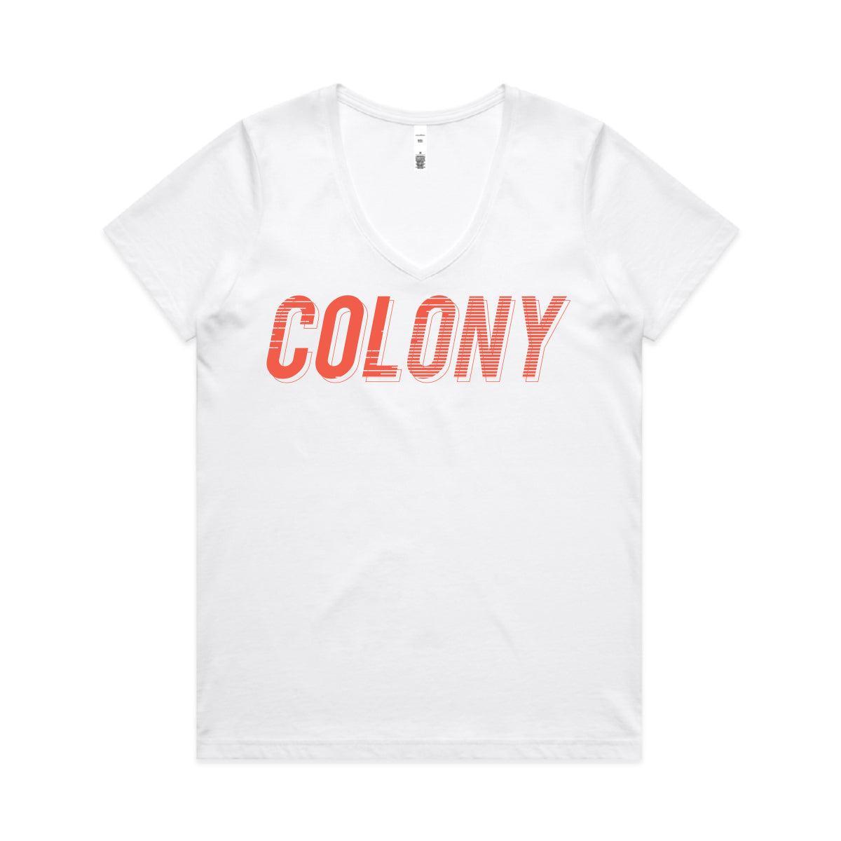 The Colony Momentum Womens V Neck T-Shirt is a white, 100% combed cotton tee with "COLONY" in bold red letters across the chest, inspired by the Colony BMX Momentum collection.