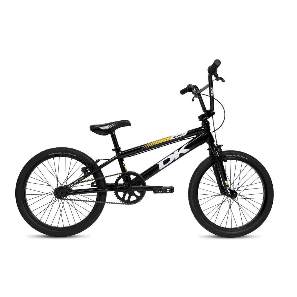 The DK Swift Pro 20 Inch Bike 2025 is a black BMX with a straight top tube, lightweight aluminum frame, black all-terrain tires, and bold white "DK" branding on the frame, shown against a white background.