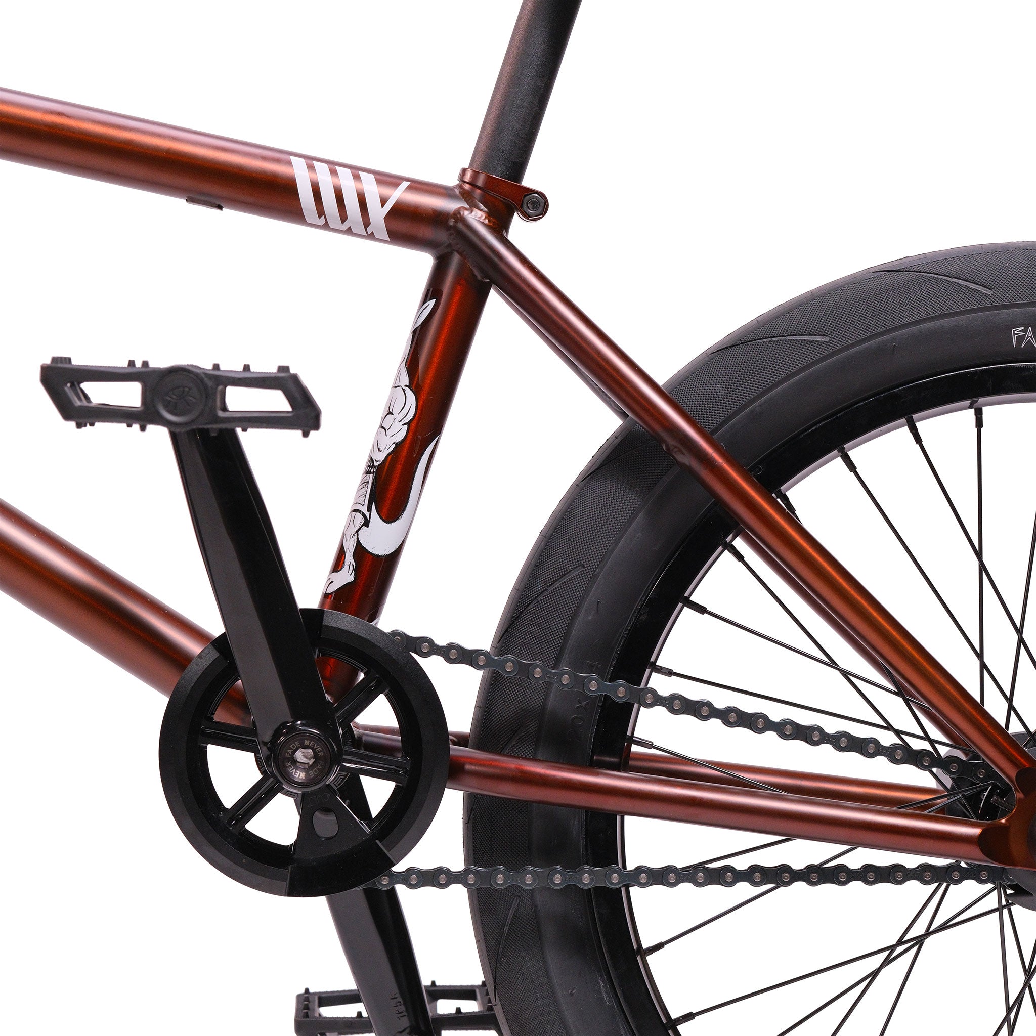 Close-up of a BMX bike's rear wheel, chain, pedal, and maroon Cult Dak X Eclat Custom 'Pat Freyne Signature' frame with white seat tube graphic.