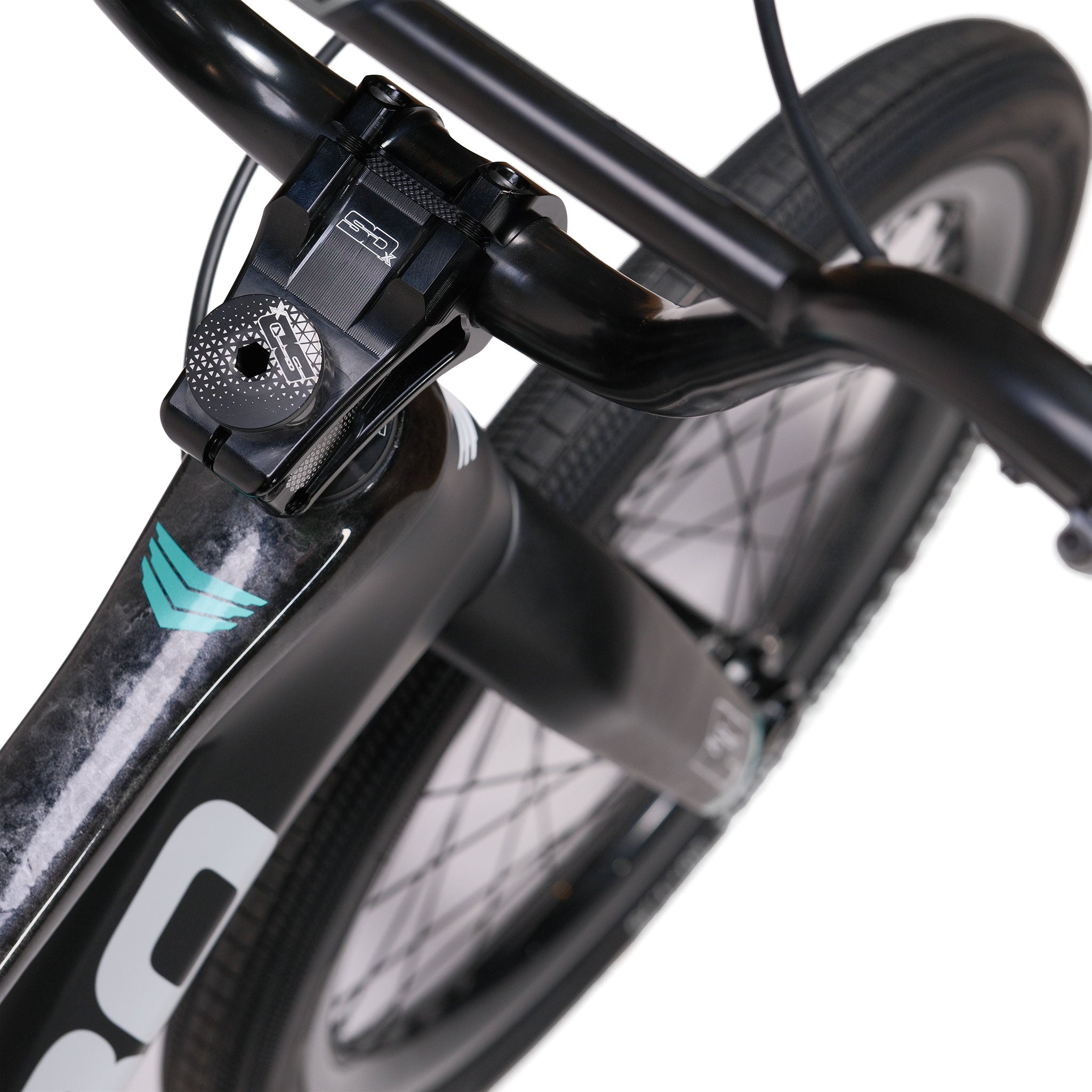 Close-up view of a black bicycle's handlebars, stem, and front wheel—showing tire tread, spokes, and part of the frame with a teal accent. This setup highlights high-quality BMX parts and resembles the streamlined design seen on a Meybo HSX Carbon Pro XXL Race Bike.