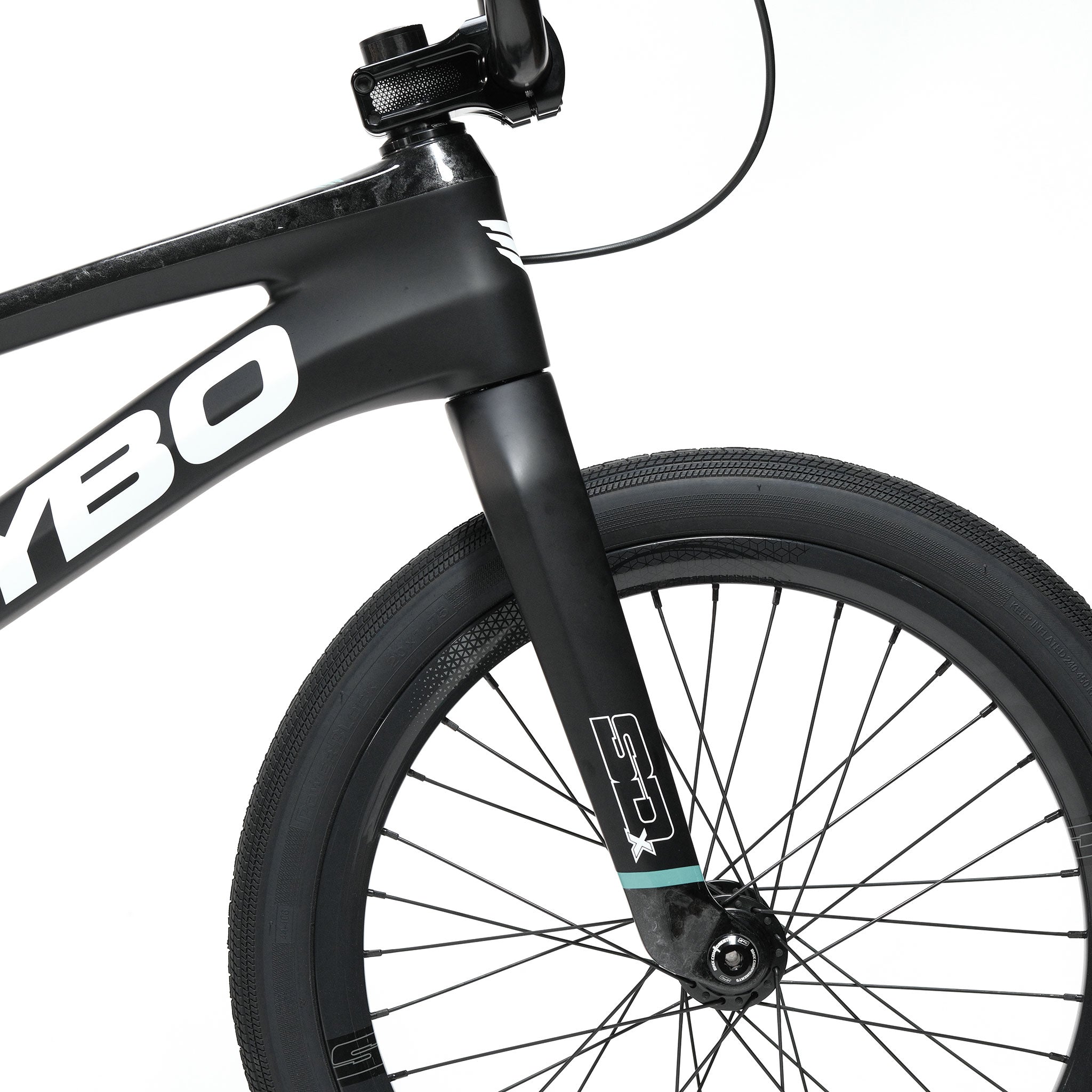 Close-up of a black bicycle’s front wheel and fork, featuring the Meybo HSX Carbon Pro XXL Race Bike, against a white background, with branding and tire tread details visible.