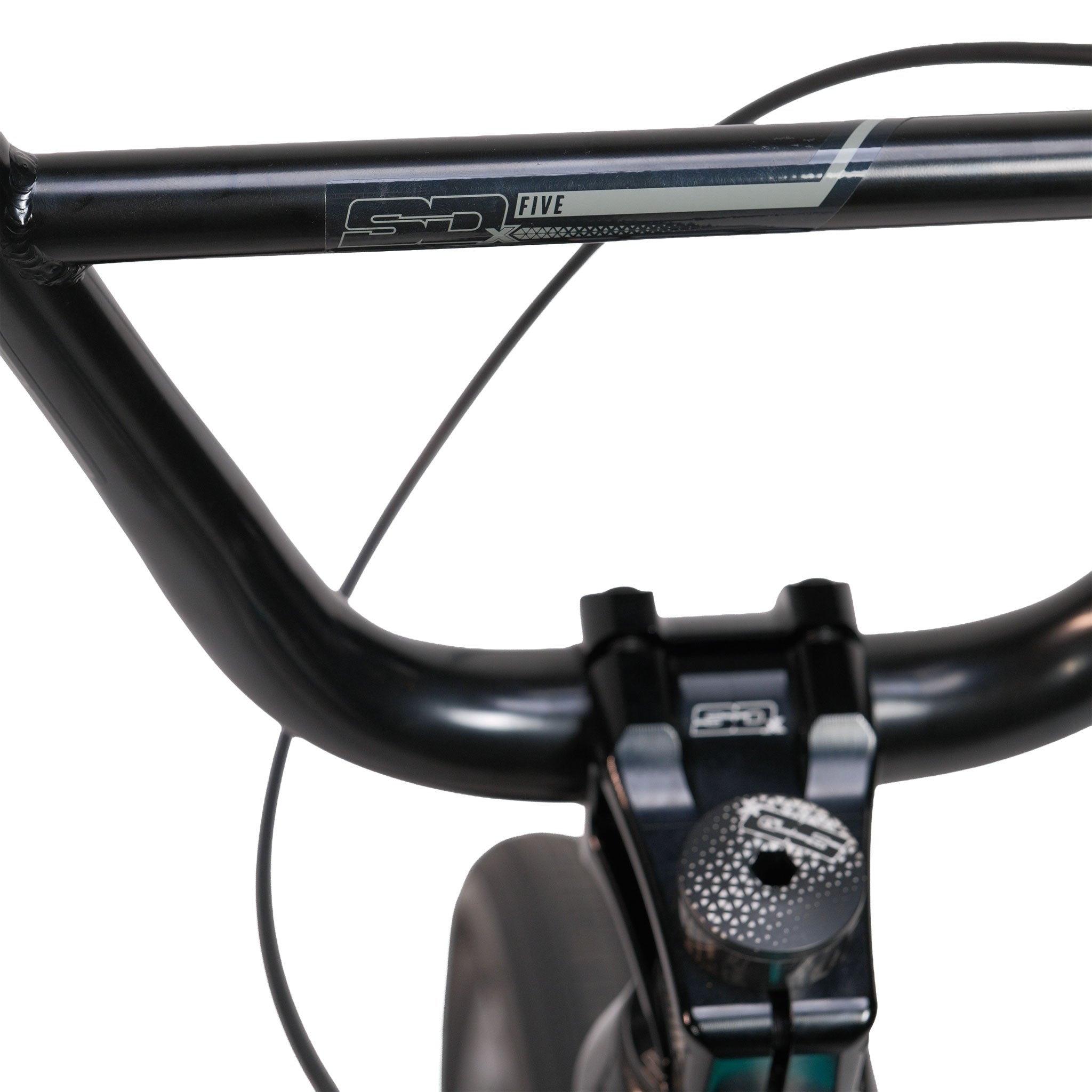 Close-up of a black handlebar and stem with visible brake cables and a partial view of the frame in the background, showcasing the premium build of the Meybo HSX Carbon Pro XXL Race Bike.