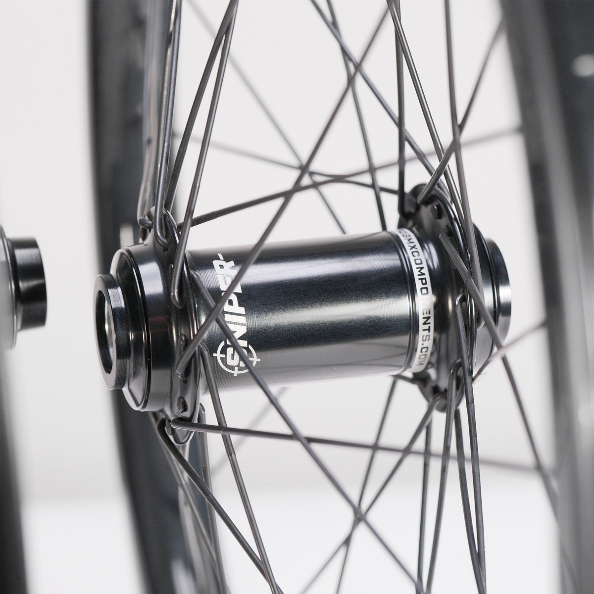 Black SD-X Sniper Evo Pro x SD-X M58 V2 20inch Wheel Set featuring a hub with thin spokes and a 20-inch rim.