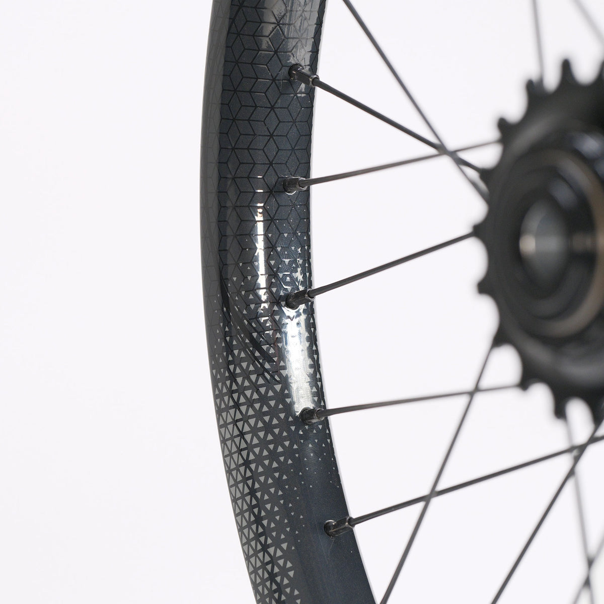 SD-X Sniper Evo Pro x SD-X M58 V2 20inch Wheel Set featuring a black repeating geometric triangle pattern and a Sniper Evo Pro rear cassette hub.