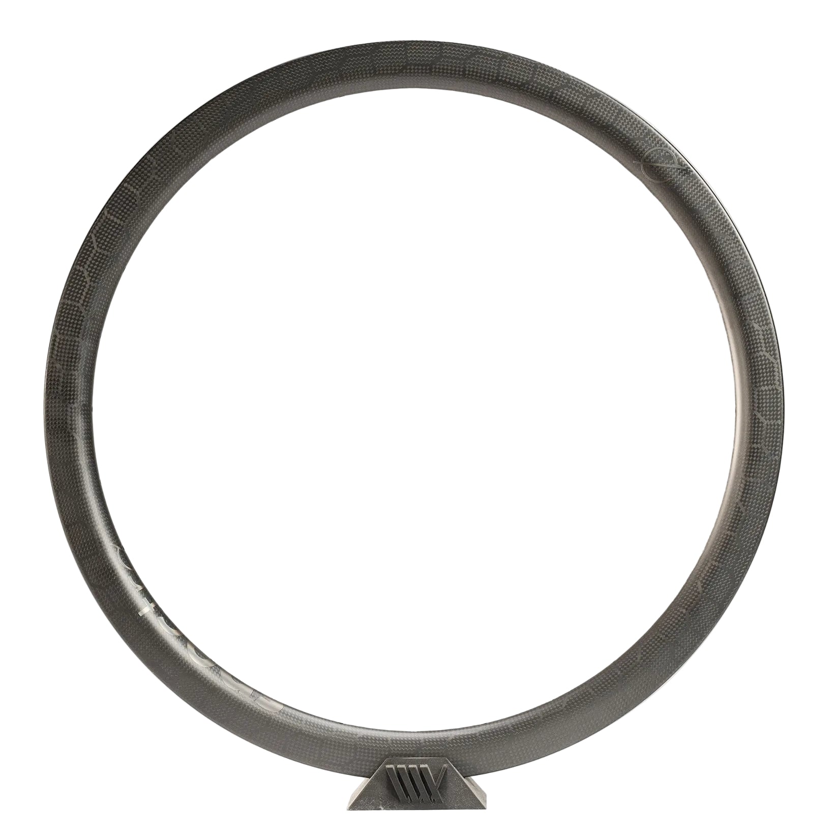 The Spectre V3 Carbon Fiber 451 28H Brakeless Rim, featuring a unidirectional finish and textured surface, stands upright on a small angled base against a plain white background.