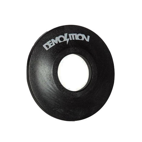 The Demolition Whistler Pro Front Hub Guard (Nylon) is a black circular guard with "Demolition" in white, featuring a center hole for grind protection—perfectly designed for the Whistler Pro front hub.