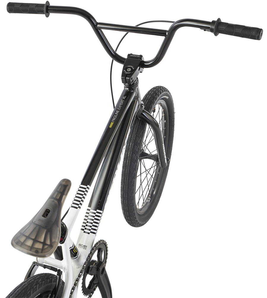 Redline Proline Expert XL bike viewed from the side, showcasing handlebars, frame, and front wheel.
