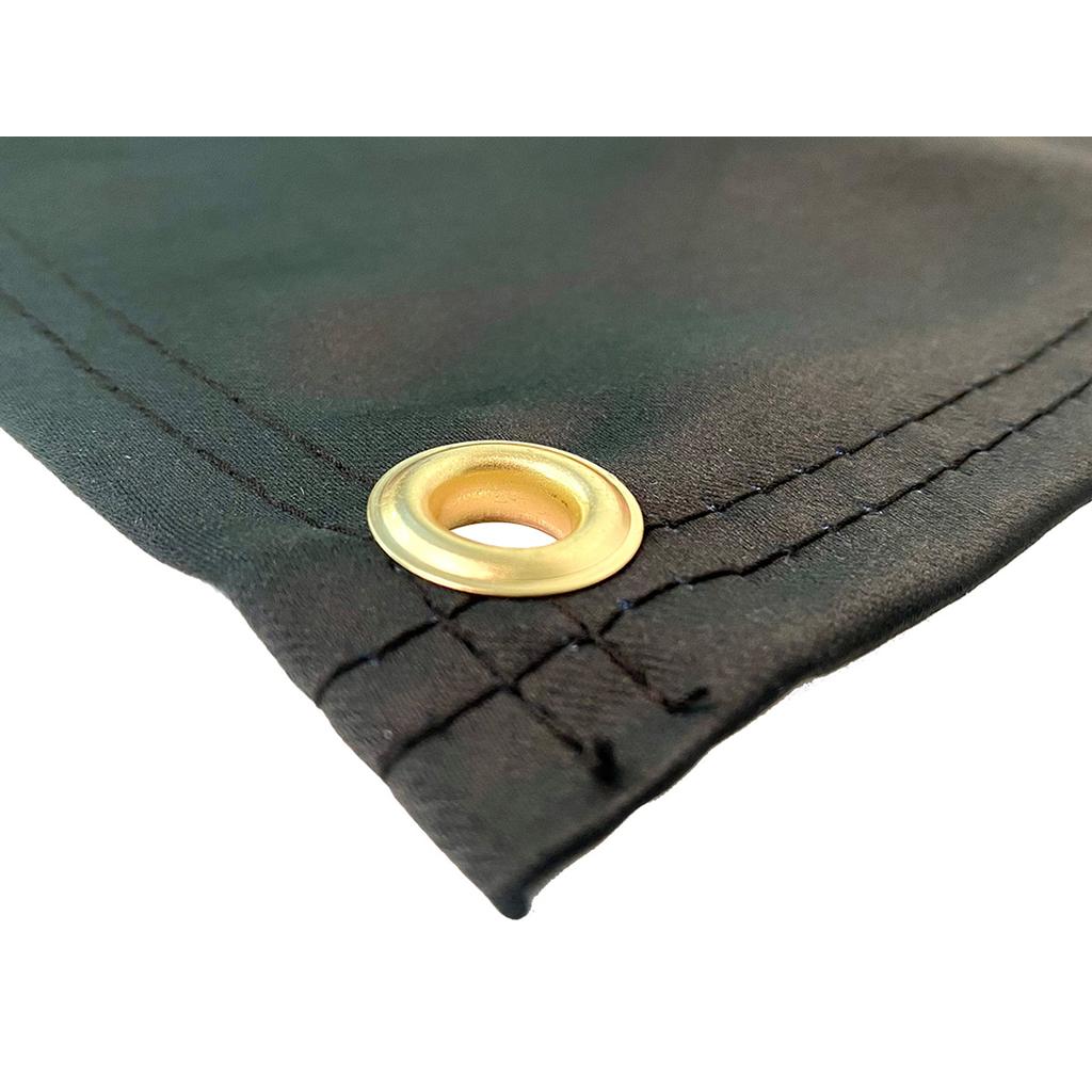 Close-up of the S&M Shield Banner’s corner, featuring reinforced stitching and a metal grommet—proudly made in the USA.