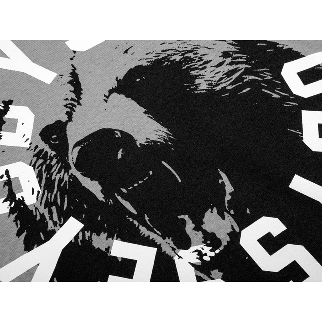 Close-up of the Odyssey Bear Central T-Shirt featuring a roaring bear graphic, bold overlapping white letters, and a standout design—ideal for anyone seeking a stylish graphic tee.