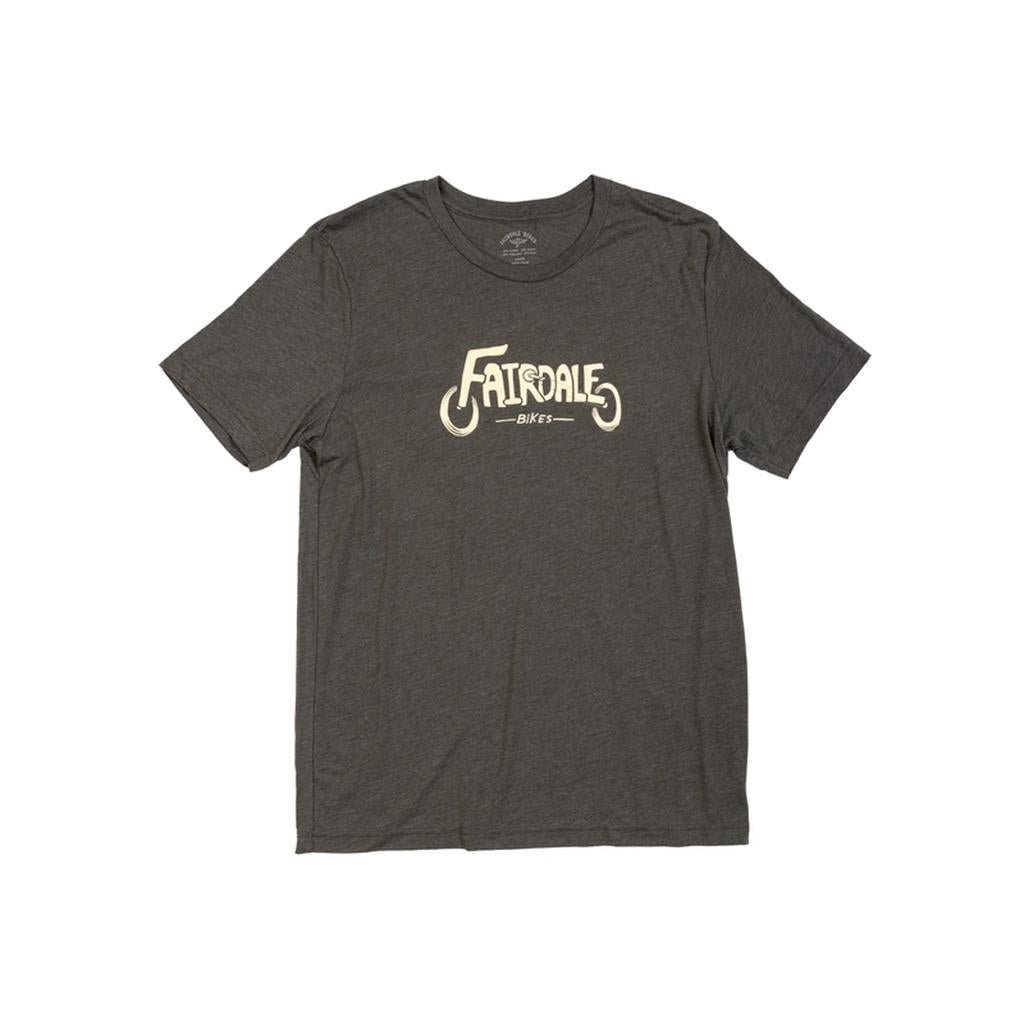 The Fairdale Wheels T-Shirt is a dark gray, short-sleeve tee with "Fatsrael Bikes" and a stylized bike graphic in white on the front, part of Fairdale’s slick tees collection.